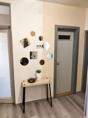 a room with a table and a door at Danube Riverview in Belgrade