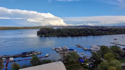 a view of a river with boats in the water at Danube Riverview in Belgrade