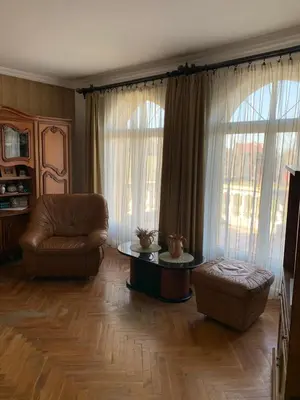 a living room with a couch and a table at Kosmaj Residence in Dučina