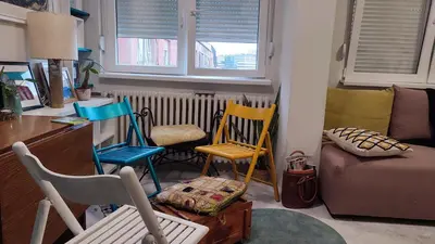 a living room with three chairs and a couch at CoCo Studio Bright & Stylish Apartment in Central Belgrade in Belgrade