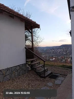 a staircase leading up to a building with a view at Stasha in Donja Mala