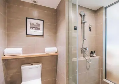 a bathroom with a toilet and a shower at Günlük daire in Belgrade