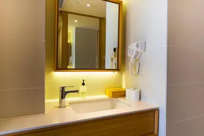 a bathroom with a sink and a mirror at Günlük daire in Belgrade