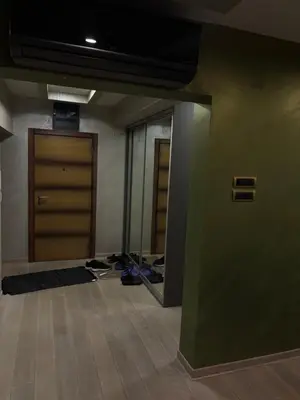 an empty room with a door and a mirror at Luxurious apartment with a jaccuzi and 4 bedrooms in Belgrade