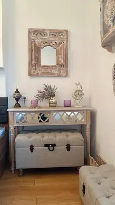 a dressing table with a mirror in a room at Beolight Apartment in Belgrade