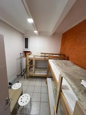 a room with a room with a bed in it at Bed and Shower Alone in Belgrade