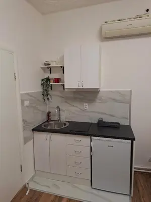 a kitchen with a sink and a counter top at White City 6 in Belgrade