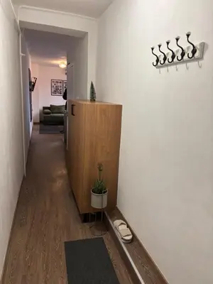 a living room with a hallway with a couch at Apartment 5th in Belgrade