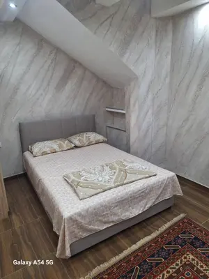 a bedroom with a bed in a room at Dream 7 in Belgrade