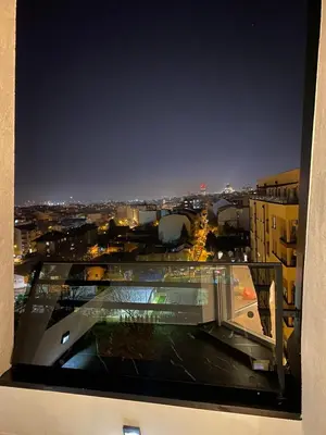 a view of a city at night from a building at Fiore in Belgrade
