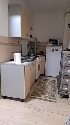 a kitchen with white appliances and a white refrigerator at Industrial 29N in Belgrade