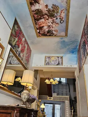 a room with paintings on the ceilings of a room at Belgrade Luxury Suite 19 in Belgrade