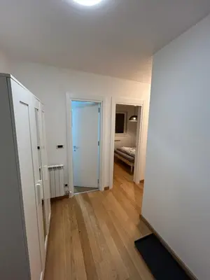 an empty room with a hallway with a door at Krfska Lux by Magenta in Belgrade