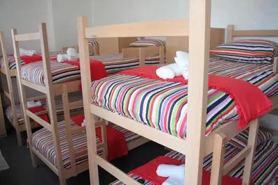 a group of bunk beds in a room at Guest House Miss Depolo in Belgrade