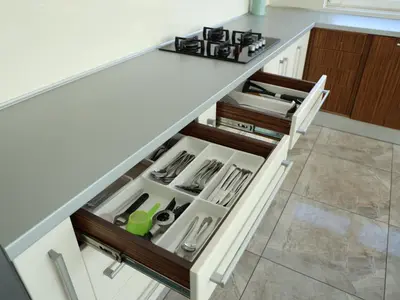 a kitchen with an open drawer in a counter at Golden Gate 21 in Ruma