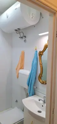 a bathroom with a sink and a mirror at Dream apartment Beograd in Belgrade
