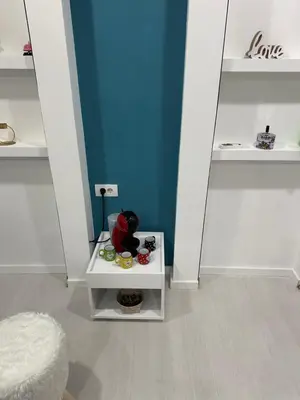 a room with a mirror and a white table at Modern studio in center of Belgrade in Belgrade