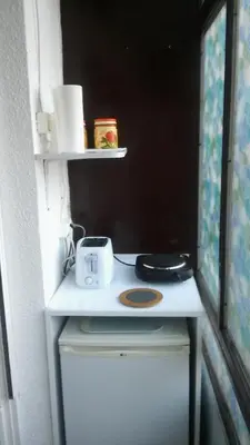 a kitchen with a counter with a toaster on it at LC Cozy Studio in Belgrade