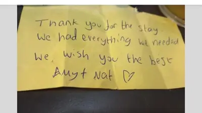 a piece of writing on a piece of yellow paper at Natali apartment in Belgrade