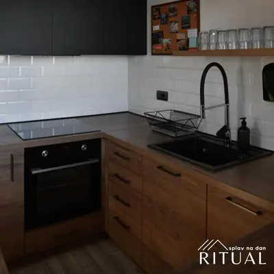 a kitchen with a sink and a dishwasher at Ritual splav in Belgrade