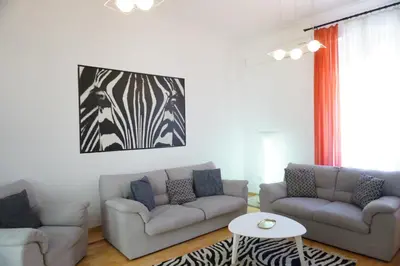 a living room with two couches and a painting on the wall at 2 BDR NEW Wake up in Belgrade for 5 in Belgrade