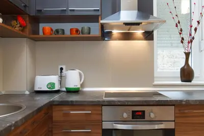 a kitchen with a sink and a counter top at Center 2BDR additional living Room King bed 4 pers in Belgrade