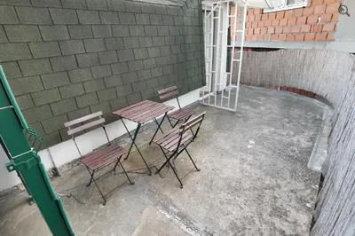 a group of chairs and tables in a building at Konza1 in Belgrade