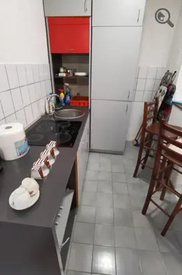 a small kitchen with a counter and a sink at Konza1 in Belgrade