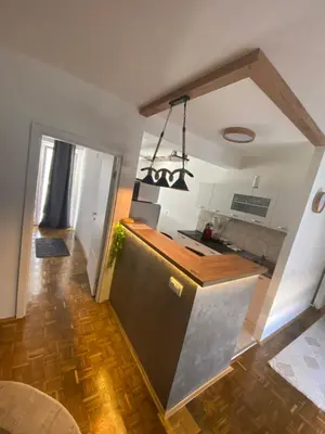 a kitchen with a sink and a counter top at Prestige in Belgrade