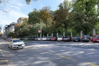a group of cars parked in a parking lot at Apartment Paradise Flora Centar in Belgrade
