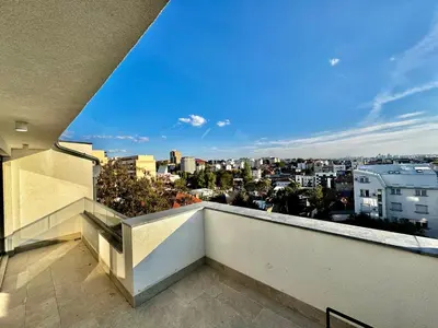 a balcony with a view of a city at Vracar-Luxury Penthouse in Belgrade