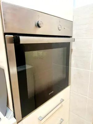 a microwave oven sitting inside of a kitchen at Mara apartment, Belgrade, New belgrade in Belgrade