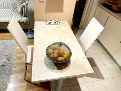 a bowl of fruit sitting on a table at Mara apartment, Belgrade, New belgrade in Belgrade