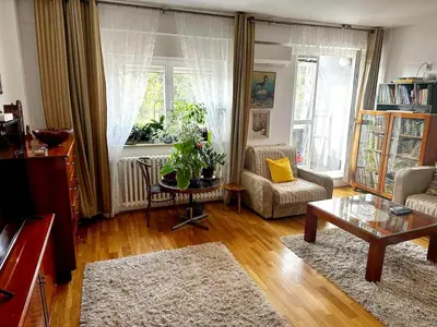 a living room with a couch and a table at Mara apartment, Belgrade, New belgrade in Belgrade
