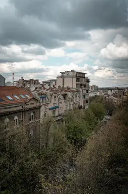 a view of a city with buildings and trees at BGLAB Small Rooftop in Belgrade