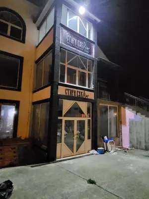 a building with a sign that reads city refuge at Stari Vuk in Belgrade