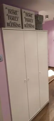 a white cabinet with a sign on top of it at Perfect place to stay in Belgrade