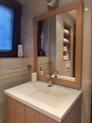 a bathroom with a sink and a mirror at Studio Skadarlija in Belgrade