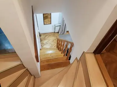 a view from the top of a staircase with wooden floors at Ozon in Belgrade