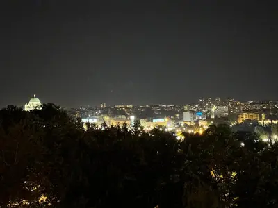 a view of a city at night with lights at Marakana in Belgrade