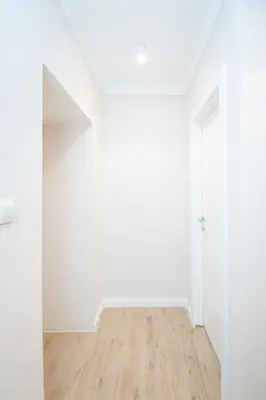 an empty room with white walls and a wooden floor at Boho House Skadarlija in Belgrade