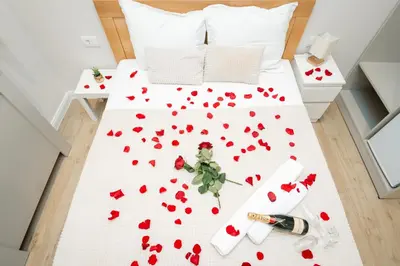 a bed with red hearts on it at Boho House Skadarlija in Belgrade