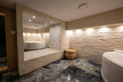 a bathroom with a tub and a toilet and a sink at Aries apartment in Belgrade in Belgrade