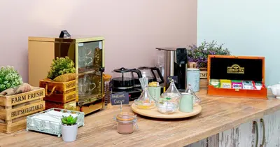 a counter top with some items on top of it at Garni Hotel Mint in Belgrade