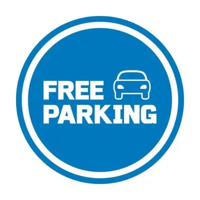 a free parking sign with a car in a circle at Apartman Tara2 in Belgrade