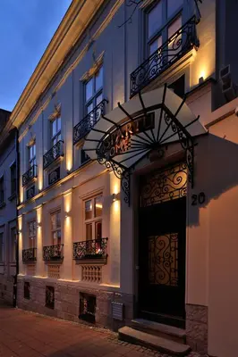 a building with a door with lights on it at Passpartu Garni hotel Rooms in Belgrade