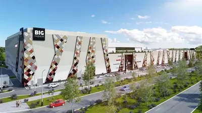 a large building with a road in front of it at Nova City Garni Hotel Signature Collection in Belgrade