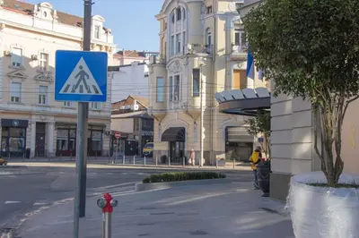 a blue sign on the side of a street at Riverside Heritage Lux and Modern 3 in Belgrade