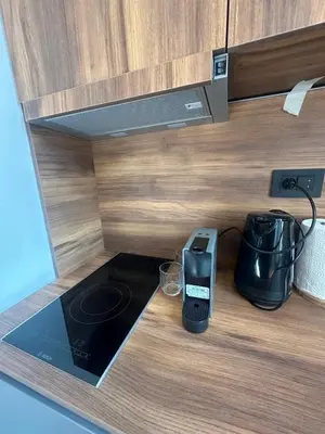 a kitchen counter with a phone and a blender at Riverside Heritage Lux and Modern 3 in Belgrade