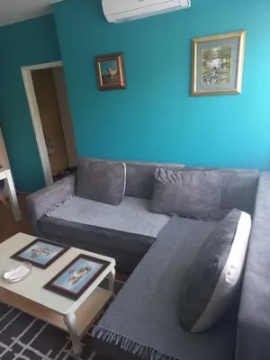 a living room with a couch and a table at Urban Panorama in Belgrade